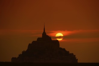 Le Mont-Saint-Michel at sunset, Benedictine monastery, Manche department, Normandy, France