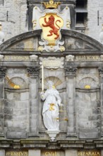Justice statue and coat of arms at Stadhuis or City Hall, Delft, South Holland, Netherlands