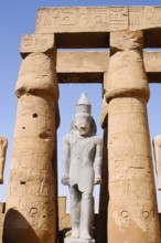Statue and colonnade, Luxor Temple, Luxor, Egypt