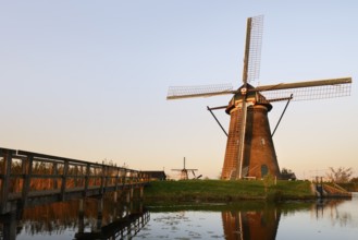 Historic windmills in the evening light, UNESCO World Heritage Site, Kinderdijk, South Holland,