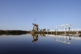 Historic windmill and drawbridge, UNESCO World Heritage Site, Kinderdijk, South Holland,