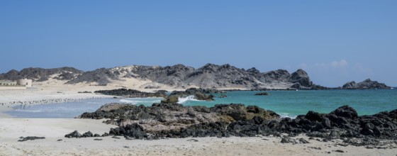 White sandy beach, secluded bay, turquoise blue sea, Omabn