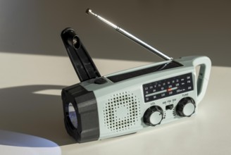 Radio with crank mode, by turning the crank we generate electricity in a dynamo, which charges a