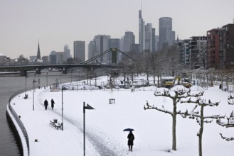 There is snow on the banks of the Main from the Wesel shipyard to the Frankfurt banking skyline,