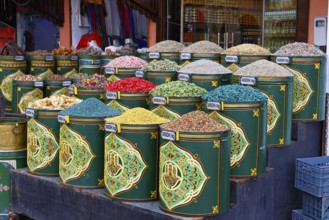 Sales stand selling spices and herbs at a market in Marrakech, historic old town, Medina, UNESCO