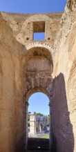 View through round arch of Constantine's Arch from the Colosseum, Rome, Lazio, Italy