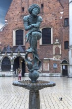 Fountain by Jan Budzillo, figure of a student, copy of a figure from the Marian Altar, Main Market