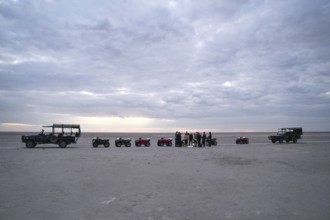 Tourists on a quad bike tour to the Makgadikgadi Salt Pans, Makgadikgadi Pans National Park, Gweta,