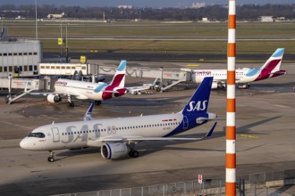 Düsseldorf Airport, DUS, Terminal A Eurowings plane at the gate, SAS plane after landing