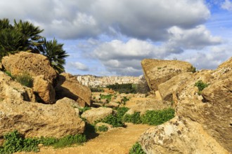 View through boulders of the modern city of Agrigento, Valley of the Temples, Agrigento, Sicily,