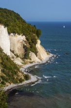 View of chalk cliffs in Jasmund National Park on Rügen, sailboat, Sassnitz, Rügen,