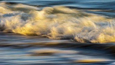 Wave play at sunrise on the chalk coast in Jasmund National Park, Rügen, Sassnitz,
