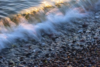 Wave play at sunrise on the chalk coast in Jasmund National Park, Rügen, Sassnitz,