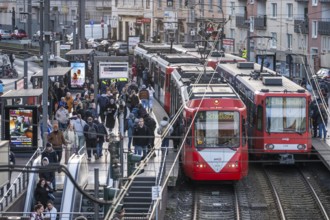 Tram stop Bahnhof Deutz/Lanxess Arena in Cologne-Deutz, rush hour in the afternoon, full platforms,