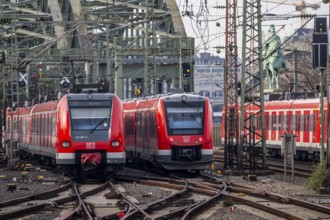Rail system in front of Cologne Central Station, Hohenzollern Bridge across the Rhine, RRX,
