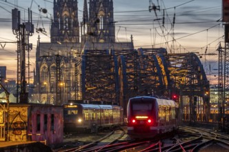 Rail track in front of Cologne Central Station, Hohenzollern Bridge across the Rhine, regional