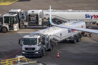 Refueling an aircraft after landing, in front of takeoff, air fuel, kerosene, Skytanking tank truck