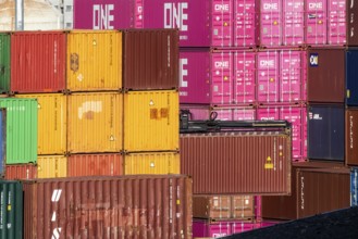 Colourful sea containers in the container port. The port of Mannheim is one of the most important