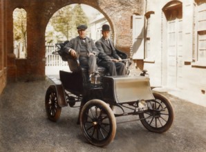 Thomas Edison and Mr. Greenfeldt in a Baker electric automobile, 1910, digitally edited