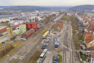 Urban aerial view with railway tracks, buildings and adjacent nature, acceptance of the Hermann