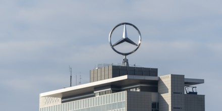 Modern building with Mercedes-Benz logo under cloudy sky, Mercedesstern, Stuttgart-Untertürkheim,