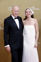 Stellan Skarsgård and Renate Reinsve arriving for the European Film Awards at the House of World