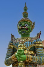 Mystical figure Yaksha as temple guard, Wat Arun Buddhist temple, Bangkok, Thailand's metropolis,