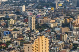 Over the rooftops of Bangkok, view from the Moon Bar on the roof terrace of the Banyan Tree Hotel,