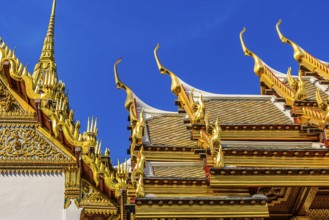 The Grand Royal Palace, the gilded Abhorn Bimok Pavilion with overlapping roofs and curved chofas,