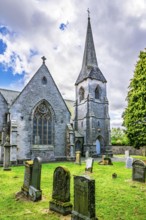 Church and cemetery over Borthwick Castle, Midlothian, Scotland, UK