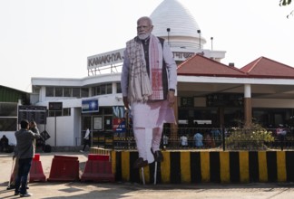 A large cutout of Indian Prime Minister Narendra Modi installed outside Kamakhya railway station as