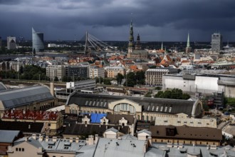 View of Riga with a combination of market buildings and distinctive church towers, Riga, Latvia,