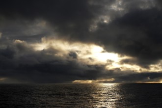 Dramatic cloud formations over the sea at sunset in Andenes, Vesterålen, Andenes, Vesterålen,