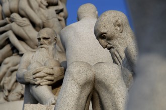 Granite figures interacting thoughtfully, part of the sculpture park, Oslo, Norway