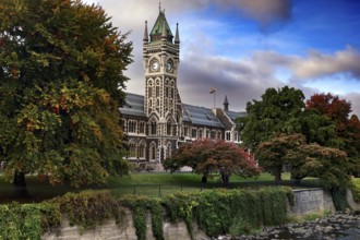 The University of Otago Clocktower building surrounded by autumn trees, Dunedin, Otago, New Zealand