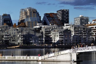 Impressive modern buildings along the water in harbor area, Oslo, Norway