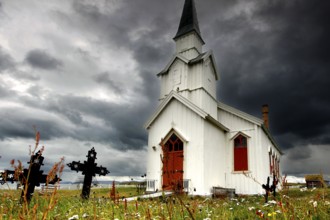 Historic church under stormy sky in Nesseby, Nesseby, Finnmark, Norway