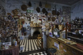 A hotel interior decorated with decorations and notes along the Stuart Highway, zero