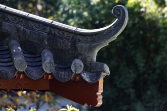 Close-up of an artfully designed roof in the Chinese Garden, Sydney, New South Wales, Australia