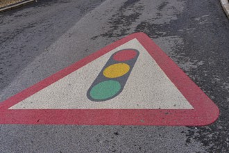 Traffic light and road signs on the asphalt, Sintra, Lisbon, Portugal