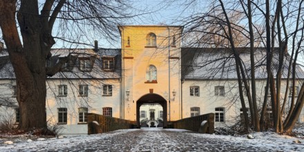 The bailey of Lauersfort Castle in winter, Moers, Wesel district, Lower Rhine, North