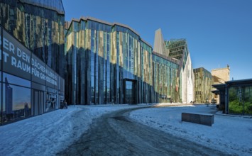 University of Leipzig, lecture hall building and Paulinum on Augustusplatz in winter with snow,
