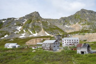 Building of the former Gold Mine Independence Mine in mountainous landscape, Independence Mine