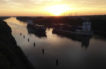 Drone shot, container ship at sunrise in the Kiel Canal, NOK, Kiel Canal, Kiel Canal,
