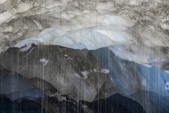 Meltwater at a glacier cave, underground glacier stream, Castner Glacier, Delta Range, Alaska