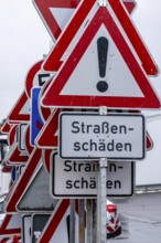 Storage for traffic signs in the yard of a road maintenance department, various signs with