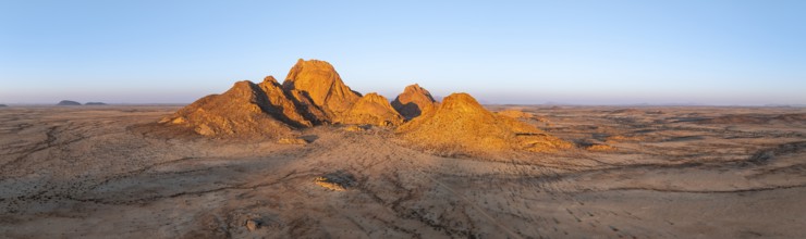 Aerial view, sunset, mountains in the desert, Spitzkoppe summit, Namib desert, Namibia