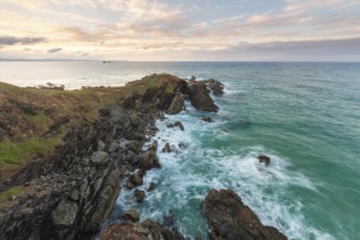 Sunset with wide view over the east coast at Cape Byron, New South Wales, Australia