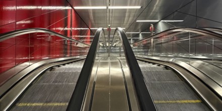 Artwork titled Three Model Spaces by Ralf Brög, escalators at Heinrich-Heine-Allee subway station,