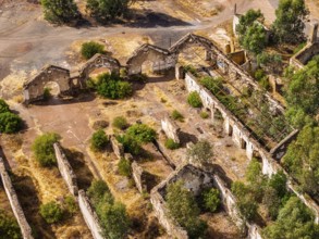 Ruins of former workshop halls, Mina de Sao Domingos, historic copper open-pit mine, aerial view,